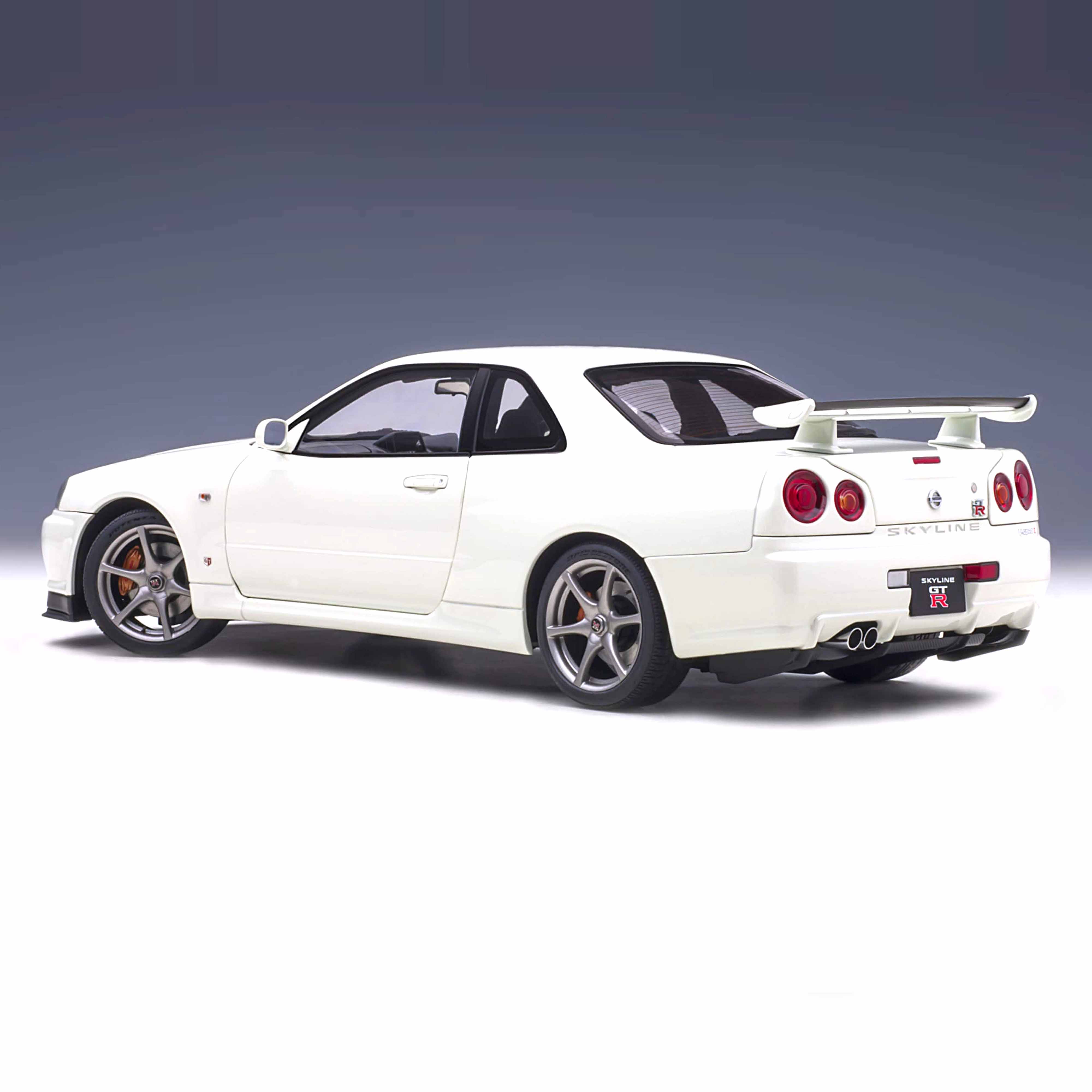 Nissan Skyline GT-R (R34) V-Spec II Blanc nacré1/18 - Image 2