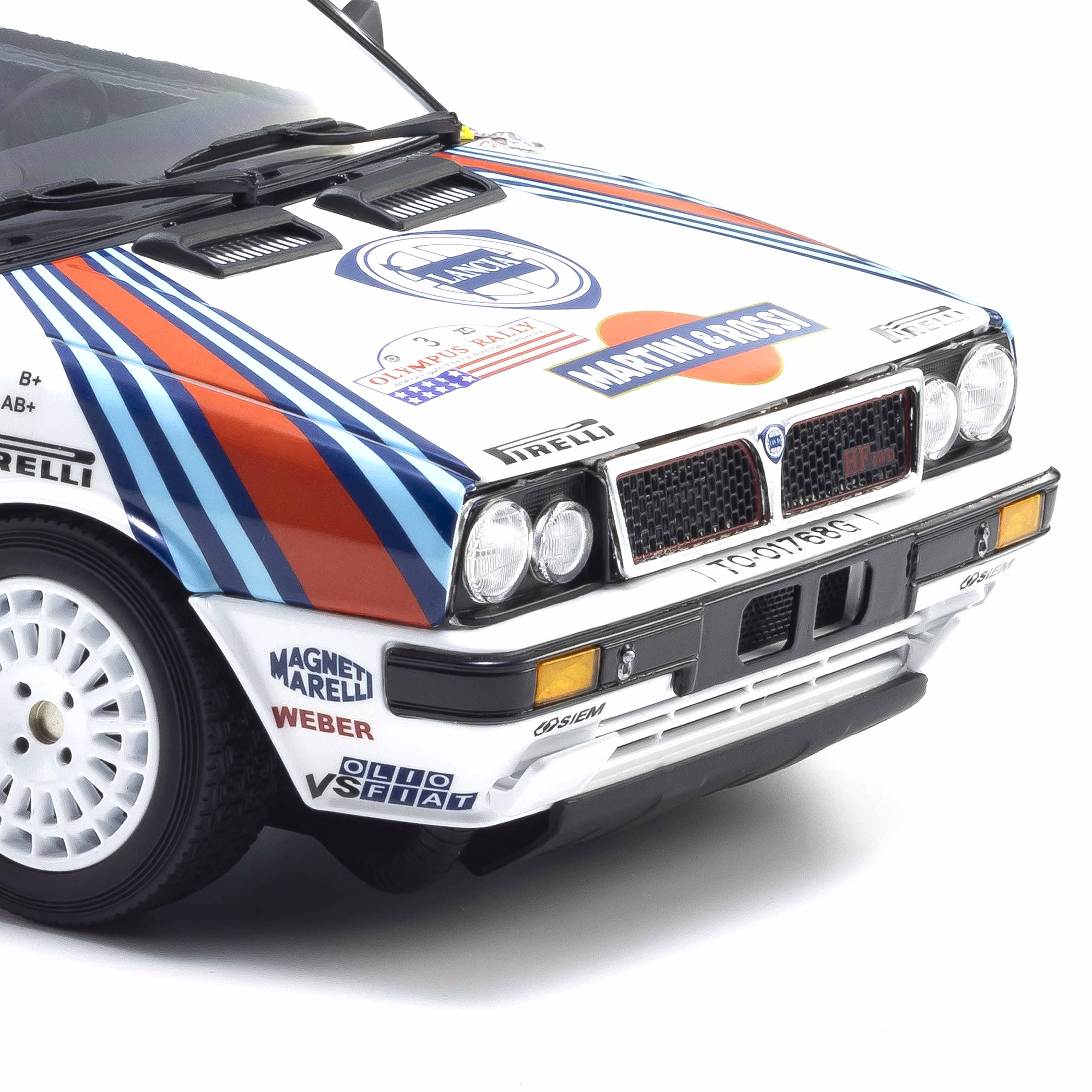 Lancia Delta HF 4WD 1987 Olympus Rally MARTINI ROSSI N°3 1/18 - Image 10